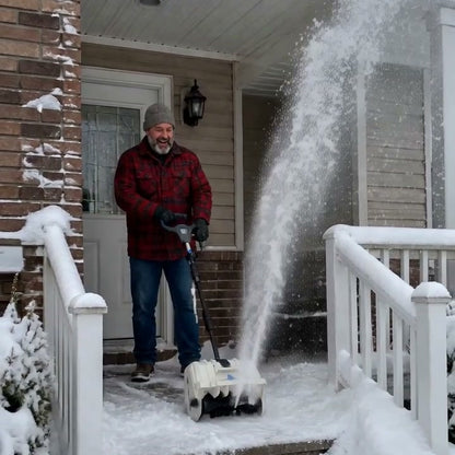 Snow Buddy clearing the front steps