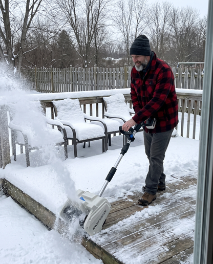 Clearing a backyard deck with Snow Buddy